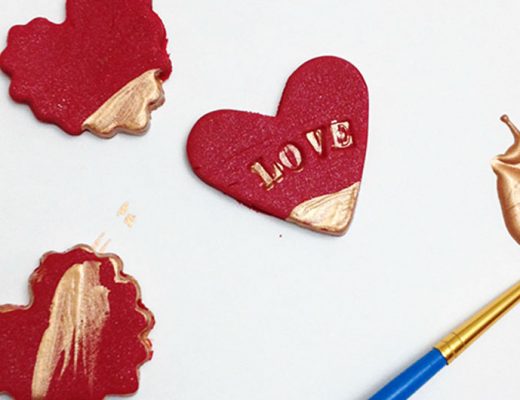 DIY clay magnets valentines showing paintbrush with gold paint.-MamiTalks.com
